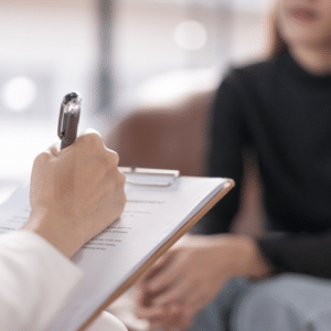 Therapist speaking with a patient during an outpatient recovery session