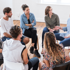 Group therapy session showing treatment options for prescription drug addiction.
